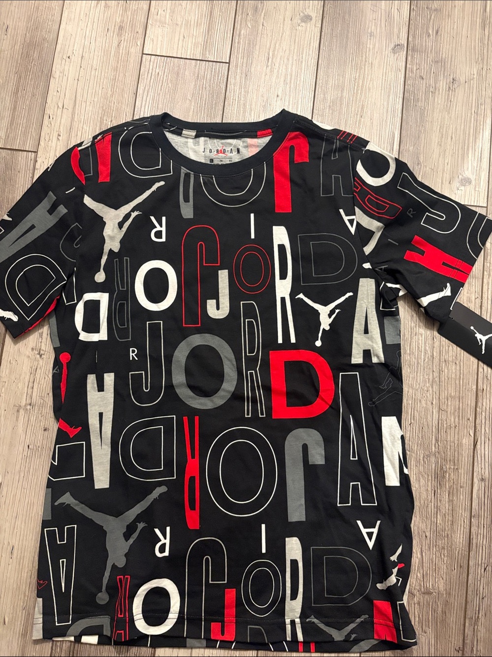 NWT Jordan Black Short Sleeve Tee with Red & Gray Allover Logo kids